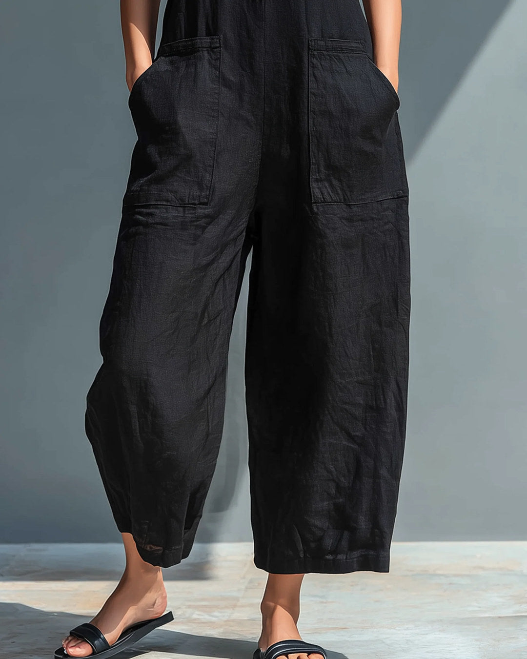 Carlotta | Combinaison minimaliste sans manches, noire