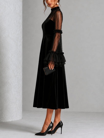 Berenice | Robe midi noire en velours à manches en tulle