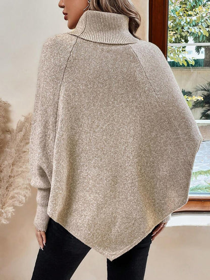 Alessia | Pull poncho torsadé à col montant et manches chauve-souris
