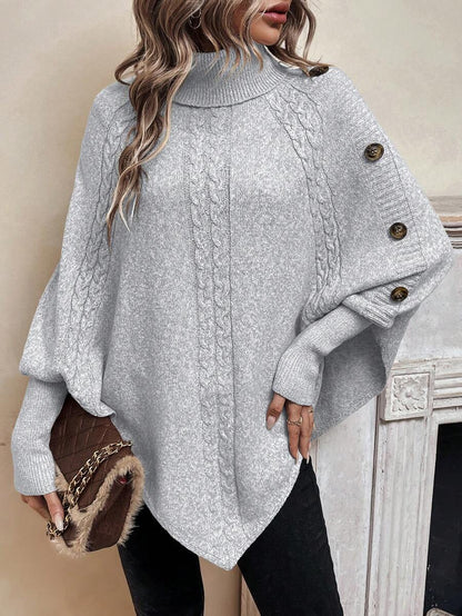 Alessia | Pull poncho torsadé à col montant et manches chauve-souris
