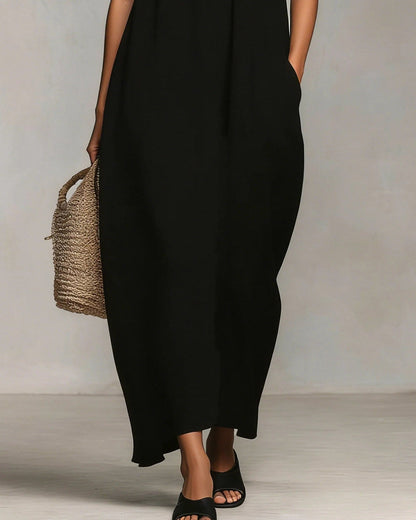 Mirta | Robe longue noire évasée à volant blanc et fines bretelles